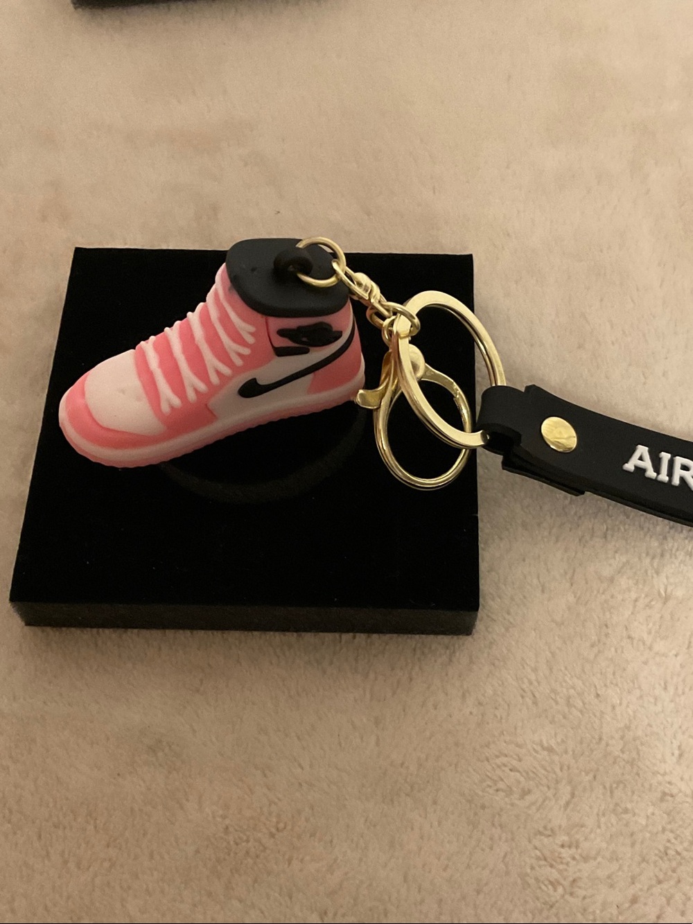 Nike Pink and White Mini Sneaker Keyring with Gold Hardware